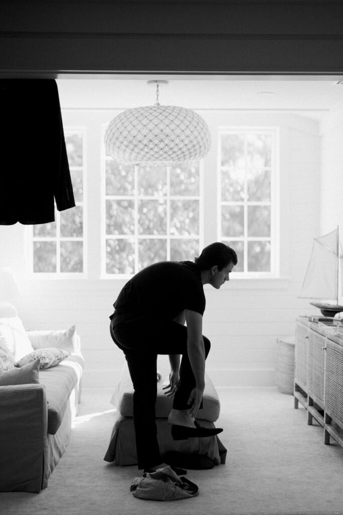 Groom getting ready, black and white